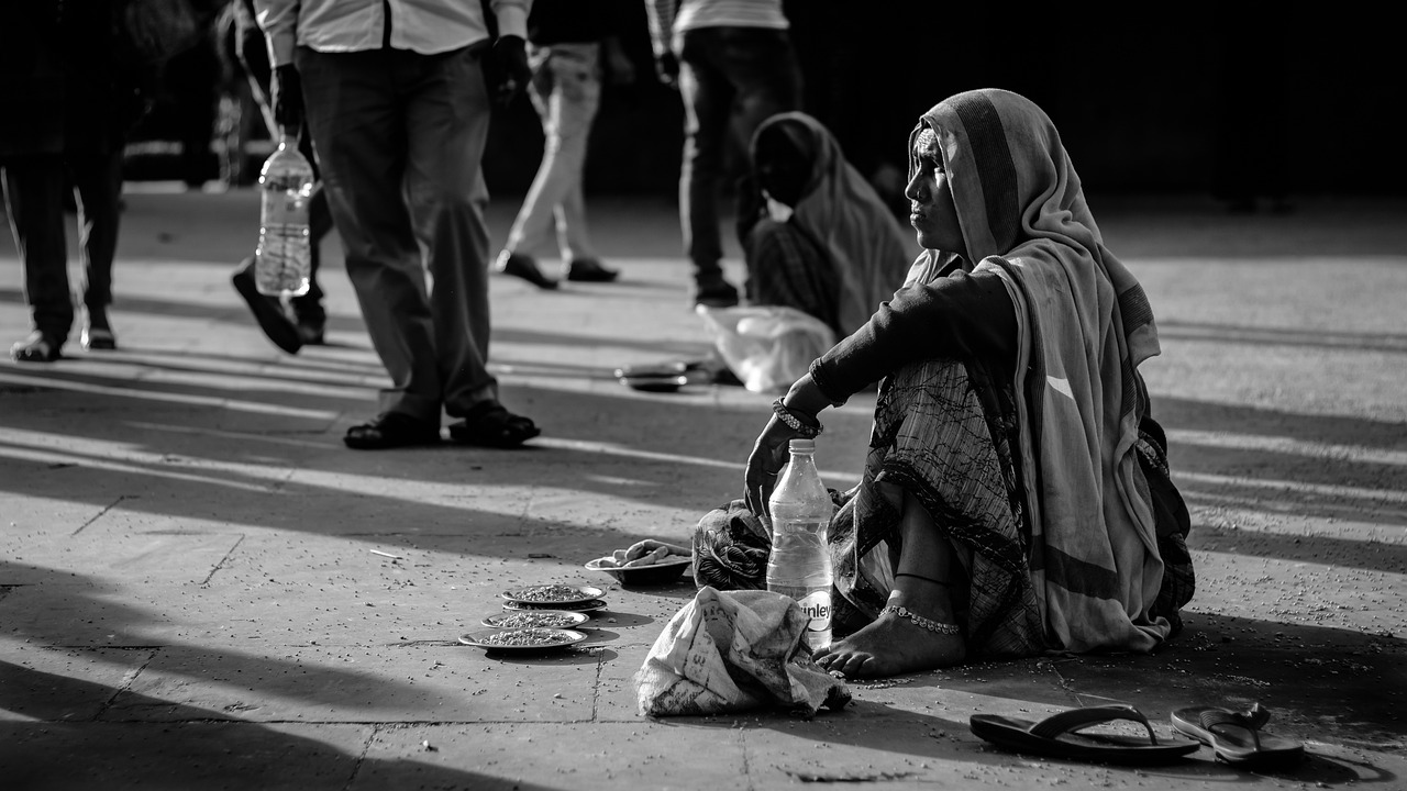 street, beggar, woman-2248101.jpg